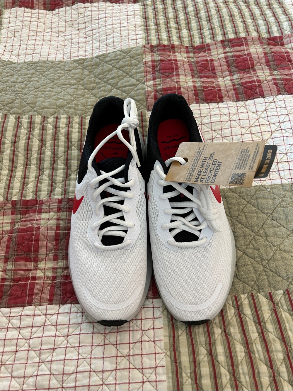 Nike White Athletic Sneakers with Red Swoosh